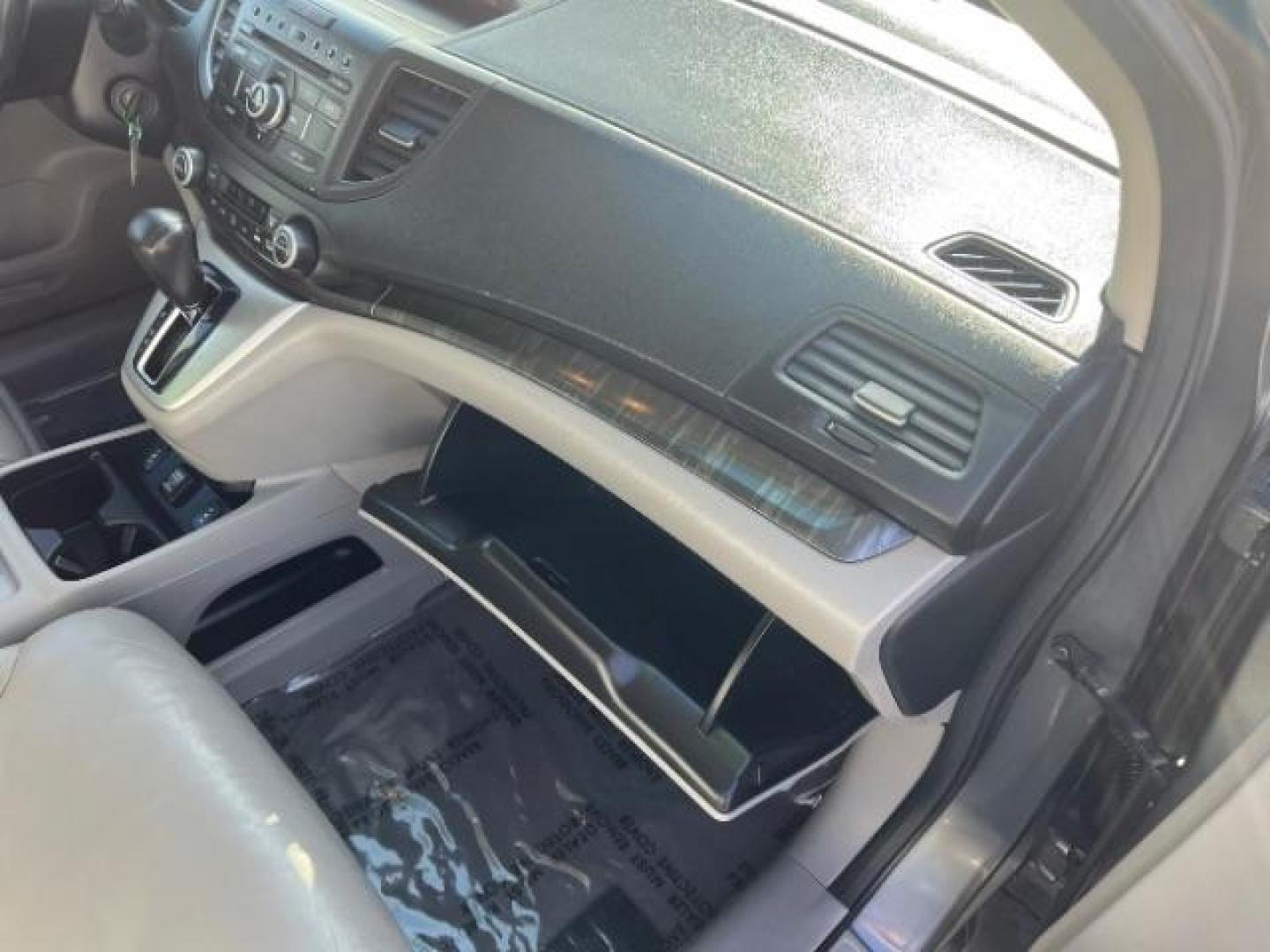 2013 Urban Titanium Metallic /Black Leather Interior Honda CR-V EX-L 4WD 5-Speed AT (2HKRM4H71DH) with an 2.4L L4 DOHC 16V engine, 5-Speed Automatic transmission, located at 940 North Main Street, Cedar City, UT, 84720, (435) 628-0023, 37.692936, -113.061897 - Photo#28