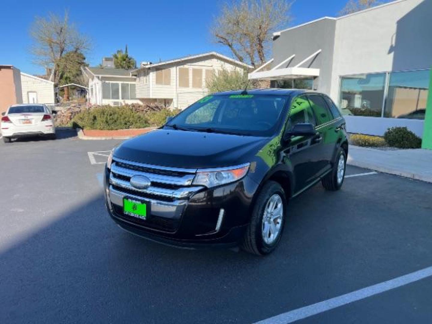 2013 Kodiak Brown Metallic /Charcoal Black/Gray Inserts Ford Edge SEL (2FMDK3JC1DB) , Automatic transmission, located at 940 North Main Street, Cedar City, UT, 84720, (435) 628-0023, 37.692936, -113.061897 - We specialize in helping ALL people get the best financing available. No matter your credit score, good, bad or none we can get you an amazing rate. Had a bankruptcy, divorce, or repossessions? We give you the green light to get your credit back on the road. Low down and affordable payments that fit - Photo#2