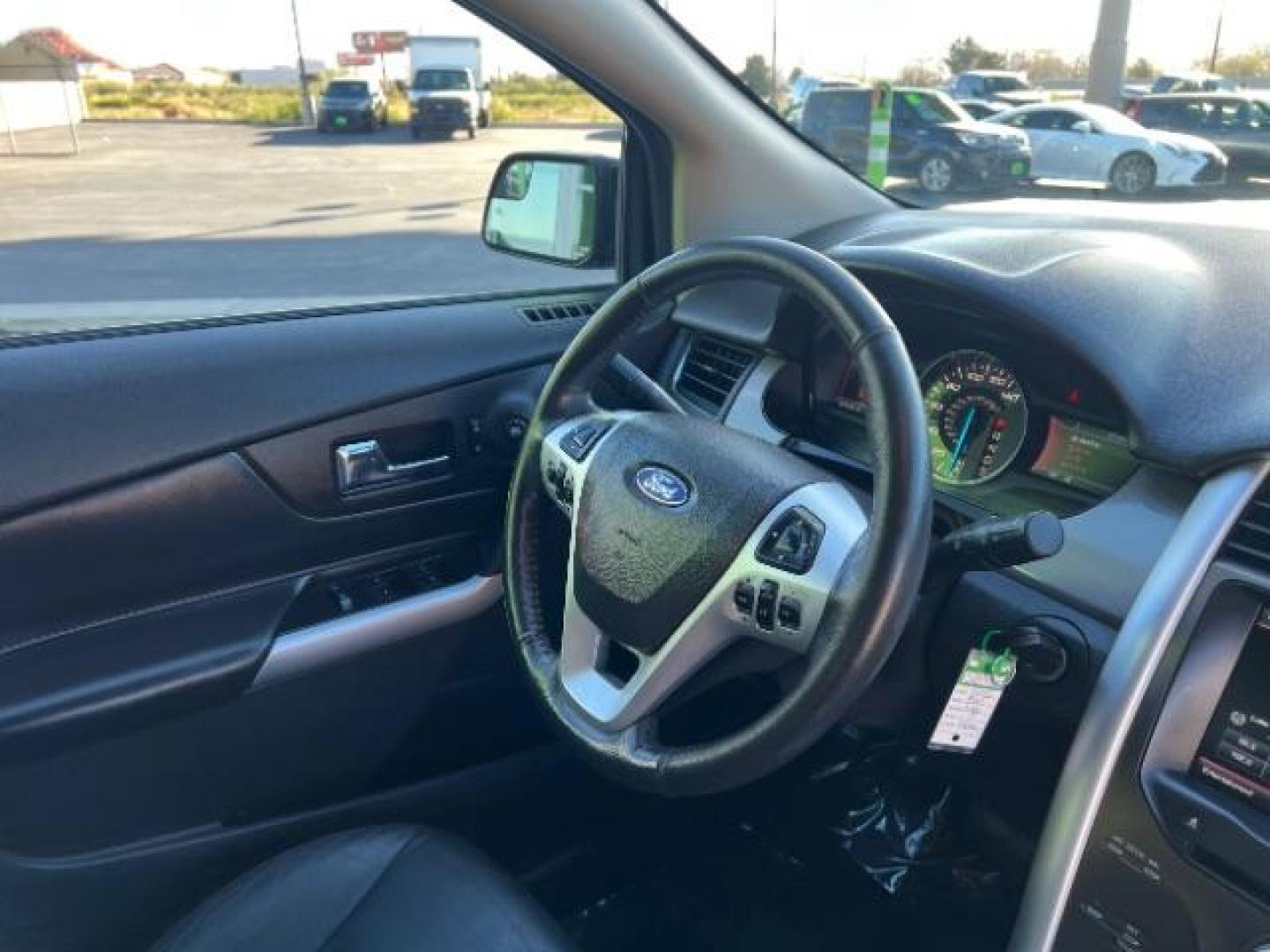 2013 Kodiak Brown Metallic /Charcoal Black/Gray Inserts Ford Edge SEL (2FMDK3JC1DB) , Automatic transmission, located at 940 North Main Street, Cedar City, UT, 84720, (435) 628-0023, 37.692936, -113.061897 - We specialize in helping ALL people get the best financing available. No matter your credit score, good, bad or none we can get you an amazing rate. Had a bankruptcy, divorce, or repossessions? We give you the green light to get your credit back on the road. Low down and affordable payments that fit - Photo#30