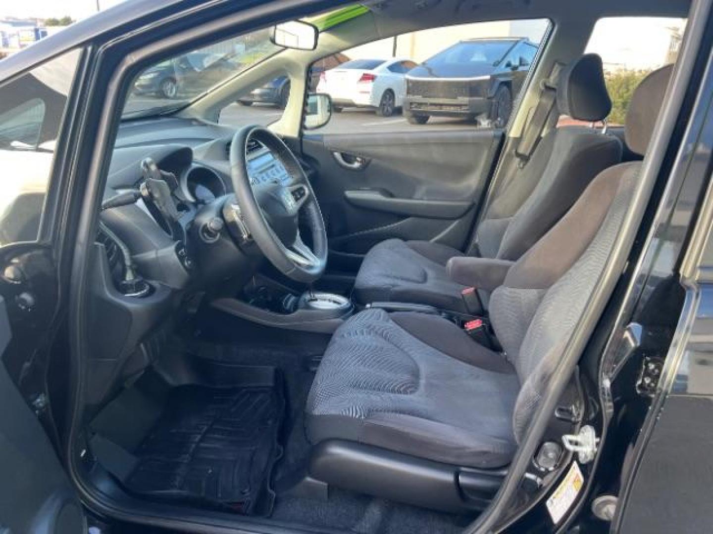 2010 Crystal Black Pearl /Black Honda Fit Sport (JHMGE8H4XAC) with an 1.5L I-4 i-VTEC variable valve control engine, Automatic transmission, located at 1865 East Red Hills Pkwy, St. George, 84770, (435) 628-0023, 37.120850, -113.543640 - Looking for a fun, fuel-efficient ride that is easy to own and even easier to love? This 2010 Honda Fit Sport is exactly what you need! The Fit is famous for being one of the most practical and reliable cars on the road, and this Sport trim takes it up a notch with leather seats, alloy wheels, navig - Photo#14