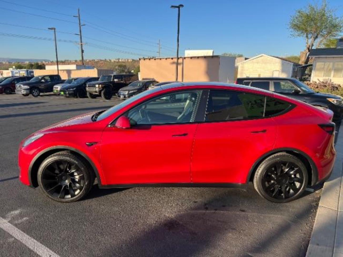 2021 Red Multi-Coat /Black Tesla Model Y Long Range Dual Motor All-Wheel Drive (5YJYGAEE4MF) with an ELECTRIC engine, Electric transmission, located at 1865 East Red Hills Pkwy, St. George, 84770, (435) 628-0023, 37.120850, -113.543640 - Photo#5