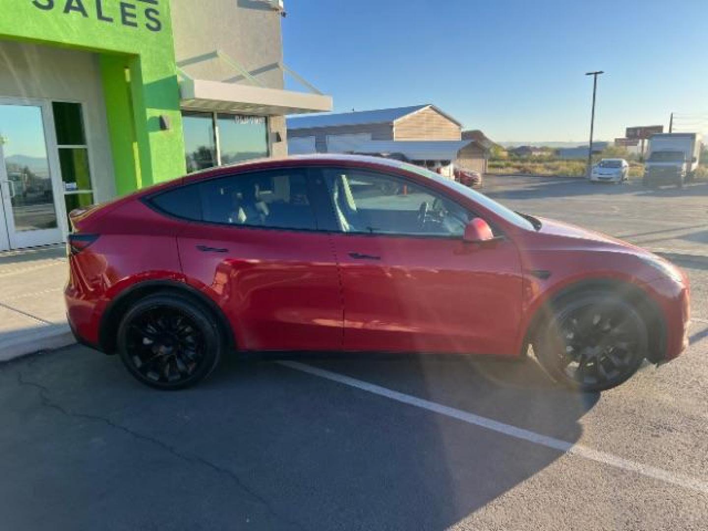 2021 Red Multi-Coat /Black Tesla Model Y Long Range Dual Motor All-Wheel Drive (5YJYGAEE4MF) with an ELECTRIC engine, Electric transmission, located at 1865 East Red Hills Pkwy, St. George, 84770, (435) 628-0023, 37.120850, -113.543640 - Photo#9