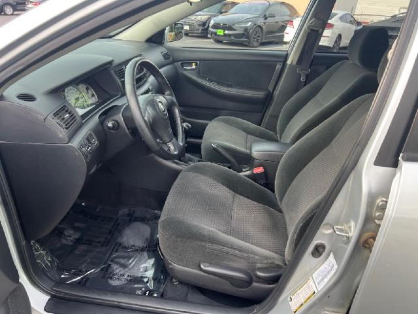 2007 Silver Streak Mica /Stone Toyota Corolla CE | S | LE (1NXBR32E97Z) with an 1.8L I-4 DOHC engine, MANUAL transmission, located at 940 North Main Street, Cedar City, UT, 84720, (435) 628-0023, 37.692936, -113.061897 - If you are looking for a reliable, fuel-efficient sedan that is easy on the wallet, this 2007 Toyota Corolla is a fantastic choice! Known for their legendary reliability, Corollas just keep going and going. This one comes loaded with air conditioning, leather seats, leather steering wheel, alloy whe - Photo#14