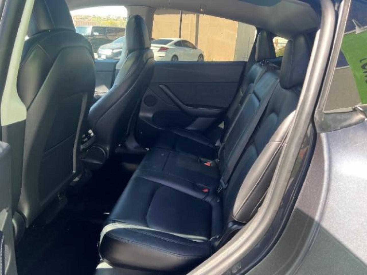 2020 Midnight Silver Metallic /Black Tesla Model Y Long Range Dual Motor All-Wheel Drive (5YJYGDEE0LF) with an ELECTRIC engine, Electric transmission, located at 1865 East Red Hills Pkwy, St. George, 84770, (435) 628-0023, 37.120850, -113.543640 - Excellent Tesla Model Y Long Range All Wheel Drive. All our Teslas come with charging kit. Battery is healthy. Gets 290 on full charge. Clean title, no accidents Still has remaining 120k mile Tesla warranty on battery and motor. We have aftermarket battery warranties available. Southern Utah's - Photo#21