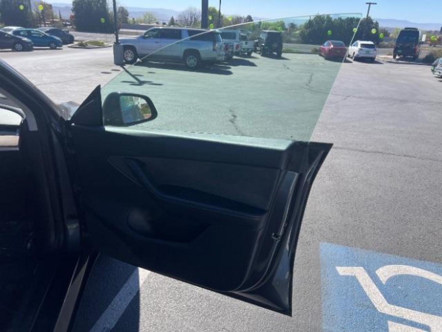 2020 Midnight Silver Metallic /Black Tesla Model Y Long Range Dual Motor All-Wheel Drive (5YJYGDEE0LF) with an ELECTRIC engine, Electric transmission, located at 1865 East Red Hills Pkwy, St. George, 84770, (435) 628-0023, 37.120850, -113.543640 - Excellent Tesla Model Y Long Range All Wheel Drive. All our Teslas come with charging kit. Battery is healthy. Gets 290 on full charge. Clean title, no accidents Still has remaining 120k mile Tesla warranty on battery and motor. We have aftermarket battery warranties available. Southern Utah's - Photo#27