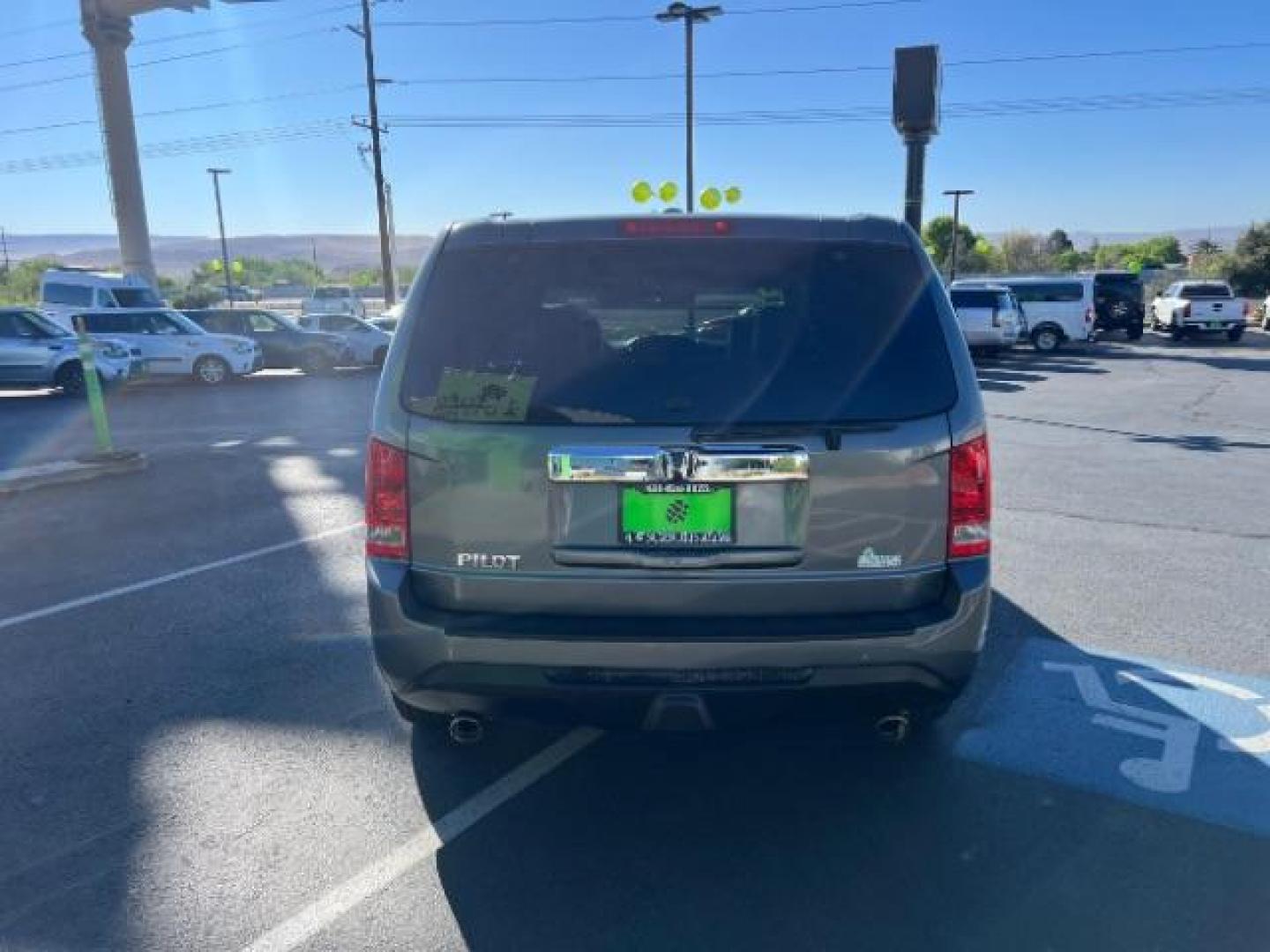 2013 Polished Metal Metallic /Gray Honda Pilot EX-L (5FNYF3H5XDB) with an 3.5L V-6 i-VTEC VCM variable valve control engine, Automatic transmission, located at 1865 East Red Hills Pkwy, St. George, 84770, (435) 628-0023, 37.120850, -113.543640 - We specialize in helping ALL people get the best financing available. No matter your credit score, good, bad or none we can get you an amazing rate. Had a bankruptcy, divorce, or repossessions? We give you the green light to get your credit back on the road. Low down and affordable payments that fit- Photo#5