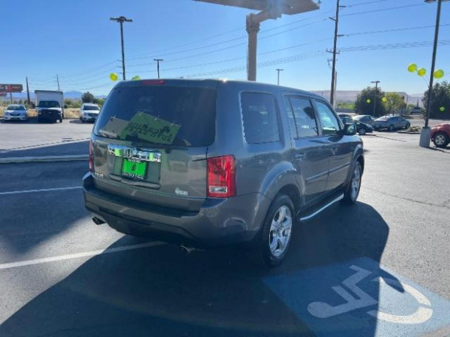 2013 Polished Metal Metallic /Gray Honda Pilot EX-L (5FNYF3H5XDB) with an 3.5L V-6 i-VTEC VCM variable valve control engine, Automatic transmission, located at 1865 East Red Hills Pkwy, St. George, 84770, (435) 628-0023, 37.120850, -113.543640 - We specialize in helping ALL people get the best financing available. No matter your credit score, good, bad or none we can get you an amazing rate. Had a bankruptcy, divorce, or repossessions? We give you the green light to get your credit back on the road. Low down and affordable payments that fit- Photo#6