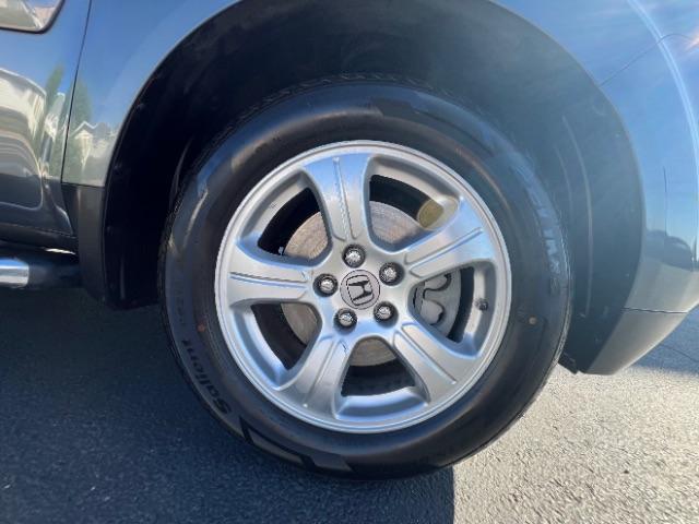 2013 Polished Metal Metallic /Gray Honda Pilot EX-L (5FNYF3H5XDB) with an 3.5L V-6 i-VTEC VCM variable valve control engine, Automatic transmission, located at 940 North Main Street, Cedar City, UT, 84720, (435) 628-0023, 37.692936, -113.061897 - We specialize in helping ALL people get the best financing available. No matter your credit score, good, bad or none we can get you an amazing rate. Had a bankruptcy, divorce, or repossessions? We give you the green light to get your credit back on the road. Low down and affordable payments that fit - Photo#8