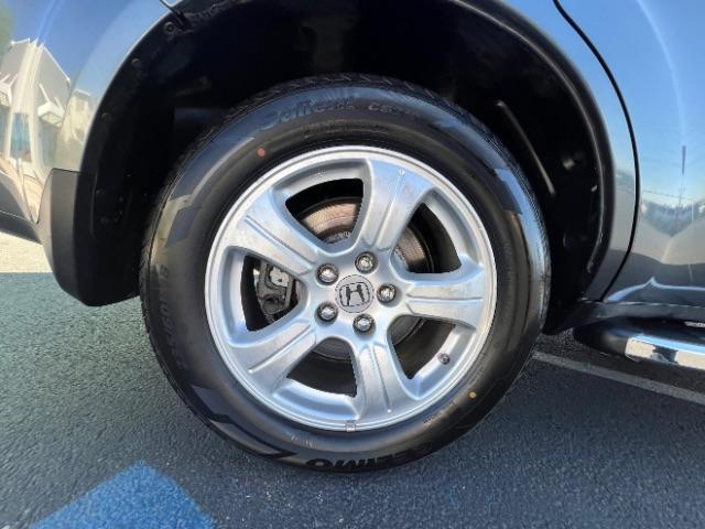 2013 Polished Metal Metallic /Gray Honda Pilot EX-L (5FNYF3H5XDB) with an 3.5L V-6 i-VTEC VCM variable valve control engine, Automatic transmission, located at 940 North Main Street, Cedar City, UT, 84720, (435) 628-0023, 37.692936, -113.061897 - We specialize in helping ALL people get the best financing available. No matter your credit score, good, bad or none we can get you an amazing rate. Had a bankruptcy, divorce, or repossessions? We give you the green light to get your credit back on the road. Low down and affordable payments that fit - Photo#11