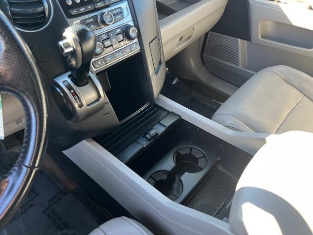 2013 Polished Metal Metallic /Gray Honda Pilot EX-L (5FNYF3H5XDB) with an 3.5L V-6 i-VTEC VCM variable valve control engine, Automatic transmission, located at 940 North Main Street, Cedar City, UT, 84720, (435) 628-0023, 37.692936, -113.061897 - We specialize in helping ALL people get the best financing available. No matter your credit score, good, bad or none we can get you an amazing rate. Had a bankruptcy, divorce, or repossessions? We give you the green light to get your credit back on the road. Low down and affordable payments that fit - Photo#18