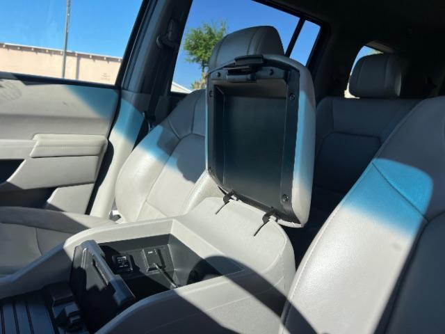 2013 Polished Metal Metallic /Gray Honda Pilot EX-L (5FNYF3H5XDB) with an 3.5L V-6 i-VTEC VCM variable valve control engine, Automatic transmission, located at 940 North Main Street, Cedar City, UT, 84720, (435) 628-0023, 37.692936, -113.061897 - We specialize in helping ALL people get the best financing available. No matter your credit score, good, bad or none we can get you an amazing rate. Had a bankruptcy, divorce, or repossessions? We give you the green light to get your credit back on the road. Low down and affordable payments that fit - Photo#19