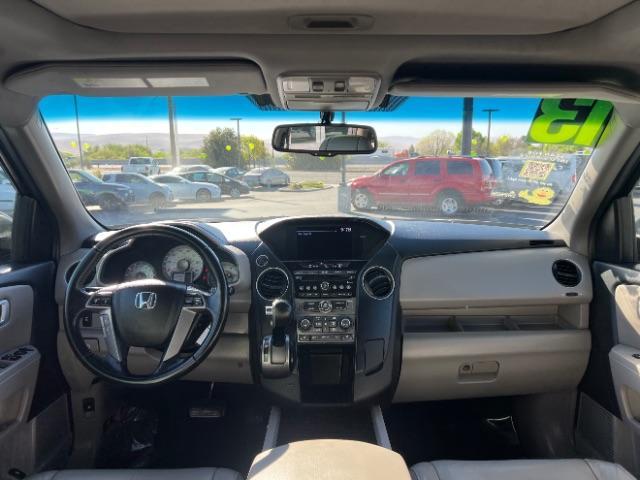 2013 Polished Metal Metallic /Gray Honda Pilot EX-L (5FNYF3H5XDB) with an 3.5L V-6 i-VTEC VCM variable valve control engine, Automatic transmission, located at 940 North Main Street, Cedar City, UT, 84720, (435) 628-0023, 37.692936, -113.061897 - We specialize in helping ALL people get the best financing available. No matter your credit score, good, bad or none we can get you an amazing rate. Had a bankruptcy, divorce, or repossessions? We give you the green light to get your credit back on the road. Low down and affordable payments that fit - Photo#24
