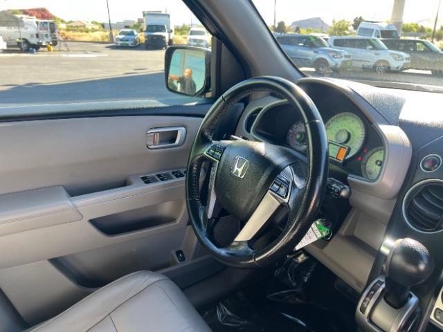2013 Polished Metal Metallic /Gray Honda Pilot EX-L (5FNYF3H5XDB) with an 3.5L V-6 i-VTEC VCM variable valve control engine, Automatic transmission, located at 940 North Main Street, Cedar City, UT, 84720, (435) 628-0023, 37.692936, -113.061897 - We specialize in helping ALL people get the best financing available. No matter your credit score, good, bad or none we can get you an amazing rate. Had a bankruptcy, divorce, or repossessions? We give you the green light to get your credit back on the road. Low down and affordable payments that fit - Photo#34