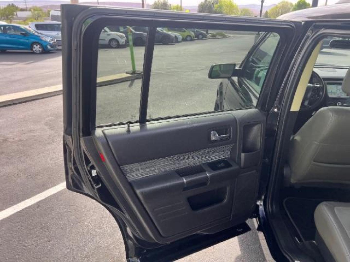 2018 Shadow Black /Charcoal Black Ford Flex SEL (2FMGK5C85JB) with an 3.5L V-6 DOHC engine, Automatic transmission, located at 940 North Main Street, Cedar City, UT, 84720, (435) 628-0023, 37.692936, -113.061897 - We specialize in helping ALL people get the best financing available. No matter your credit score, good, bad or none we can get you an amazing rate. Had a bankruptcy, divorce, or repossessions? We give you the green light to get your credit back on the road. Low down and affordable payments that fit - Photo#20