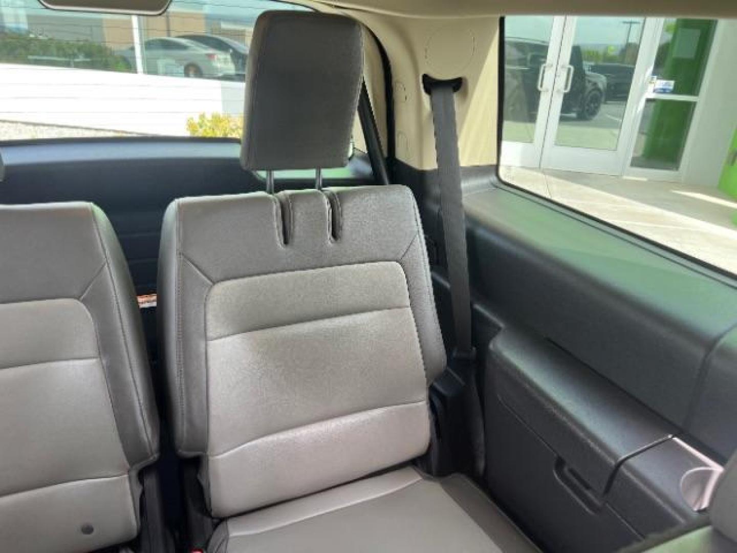2018 Shadow Black /Charcoal Black Ford Flex SEL (2FMGK5C85JB) with an 3.5L V-6 DOHC engine, Automatic transmission, located at 940 North Main Street, Cedar City, UT, 84720, (435) 628-0023, 37.692936, -113.061897 - We specialize in helping ALL people get the best financing available. No matter your credit score, good, bad or none we can get you an amazing rate. Had a bankruptcy, divorce, or repossessions? We give you the green light to get your credit back on the road. Low down and affordable payments that fit - Photo#26
