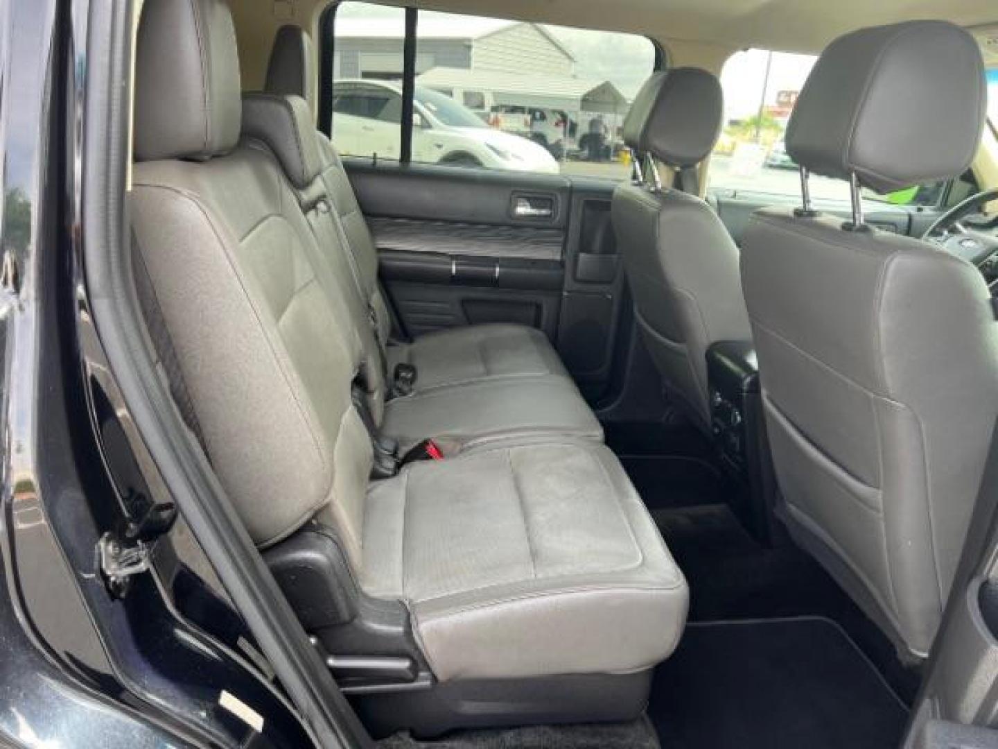 2018 Shadow Black /Charcoal Black Ford Flex SEL (2FMGK5C85JB) with an 3.5L V-6 DOHC engine, Automatic transmission, located at 940 North Main Street, Cedar City, UT, 84720, (435) 628-0023, 37.692936, -113.061897 - We specialize in helping ALL people get the best financing available. No matter your credit score, good, bad or none we can get you an amazing rate. Had a bankruptcy, divorce, or repossessions? We give you the green light to get your credit back on the road. Low down and affordable payments that fit - Photo#29