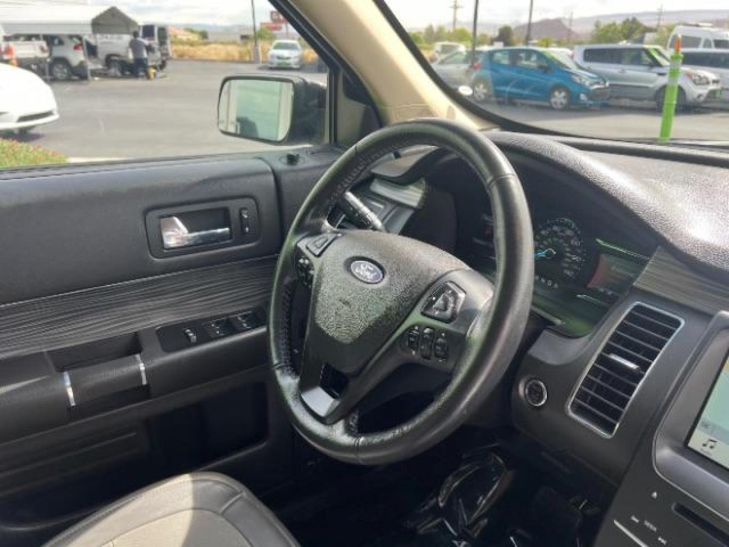 2018 Shadow Black /Charcoal Black Ford Flex SEL (2FMGK5C85JB) with an 3.5L V-6 DOHC engine, Automatic transmission, located at 940 North Main Street, Cedar City, UT, 84720, (435) 628-0023, 37.692936, -113.061897 - We specialize in helping ALL people get the best financing available. No matter your credit score, good, bad or none we can get you an amazing rate. Had a bankruptcy, divorce, or repossessions? We give you the green light to get your credit back on the road. Low down and affordable payments that fit - Photo#33