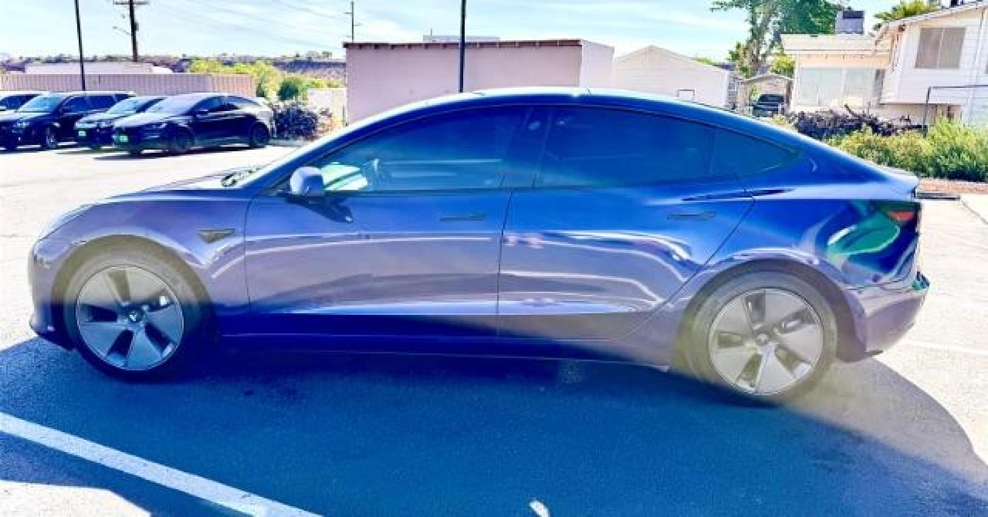 2022 Deep Blue Metallic /White/Black Tesla Model 3 Long Range Dual Motor All-Wheel Drive (5YJ3E1EB7NF) with an ELECTRIC engine, Electric transmission, located at 1865 East Red Hills Pkwy, St. George, 84770, (435) 628-0023, 37.120850, -113.543640 - Excellent Tesla Model 3 Long Range All Wheel Drive with White interior! HW3. Inside and outside in great shape. Tires are good. All our Teslas come with charging kit. Battery is near new. Gets 305 on full charge. Clean title, no accidents Still has remaining 120k mile Tesla warranty on battery a - Photo#2