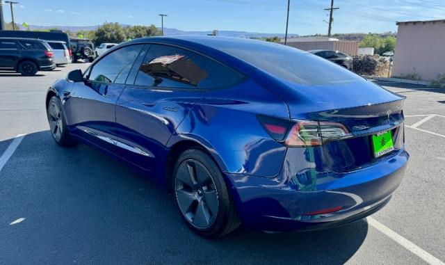 2022 Deep Blue Metallic /White/Black Tesla Model 3 Long Range Dual Motor All-Wheel Drive (5YJ3E1EB7NF) with an ELECTRIC engine, Electric transmission, located at 1865 East Red Hills Pkwy, St. George, 84770, (435) 628-0023, 37.120850, -113.543640 - Excellent Tesla Model 3 Long Range All Wheel Drive with White interior! HW3. Inside and outside in great shape. Tires are good. All our Teslas come with charging kit. Battery is near new. Gets 305 on full charge. Clean title, no accidents Still has remaining 120k mile Tesla warranty on battery a - Photo#3