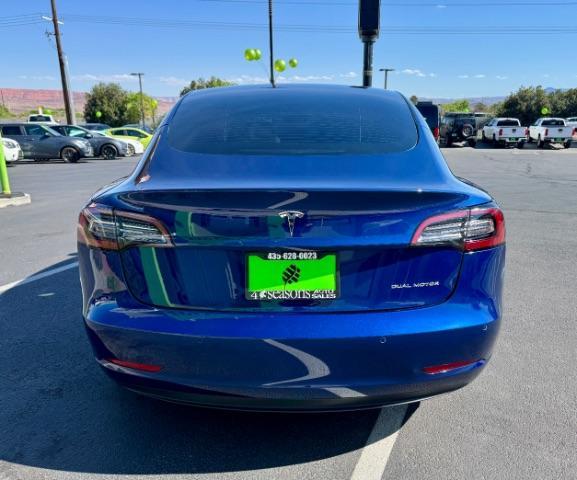 2022 Deep Blue Metallic /White/Black Tesla Model 3 Long Range Dual Motor All-Wheel Drive (5YJ3E1EB7NF) with an ELECTRIC engine, Electric transmission, located at 1865 East Red Hills Pkwy, St. George, 84770, (435) 628-0023, 37.120850, -113.543640 - Excellent Tesla Model 3 Long Range All Wheel Drive with White interior! HW3. Inside and outside in great shape. Tires are good. All our Teslas come with charging kit. Battery is near new. Gets 305 on full charge. Clean title, no accidents Still has remaining 120k mile Tesla warranty on battery a - Photo#4