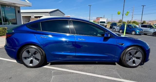 2022 Deep Blue Metallic /White/Black Tesla Model 3 Long Range Dual Motor All-Wheel Drive (5YJ3E1EB7NF) with an ELECTRIC engine, Electric transmission, located at 1865 East Red Hills Pkwy, St. George, 84770, (435) 628-0023, 37.120850, -113.543640 - Excellent Tesla Model 3 Long Range All Wheel Drive with White interior! HW3. Inside and outside in great shape. Tires are good. All our Teslas come with charging kit. Battery is near new. Gets 305 on full charge. Clean title, no accidents Still has remaining 120k mile Tesla warranty on battery a - Photo#7