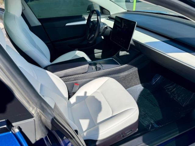 2022 Deep Blue Metallic /White/Black Tesla Model 3 Long Range Dual Motor All-Wheel Drive (5YJ3E1EB7NF) with an ELECTRIC engine, Electric transmission, located at 1865 East Red Hills Pkwy, St. George, 84770, (435) 628-0023, 37.120850, -113.543640 - Excellent Tesla Model 3 Long Range All Wheel Drive with White interior! HW3. Inside and outside in great shape. Tires are good. All our Teslas come with charging kit. Battery is near new. Gets 305 on full charge. Clean title, no accidents Still has remaining 120k mile Tesla warranty on battery a - Photo#16