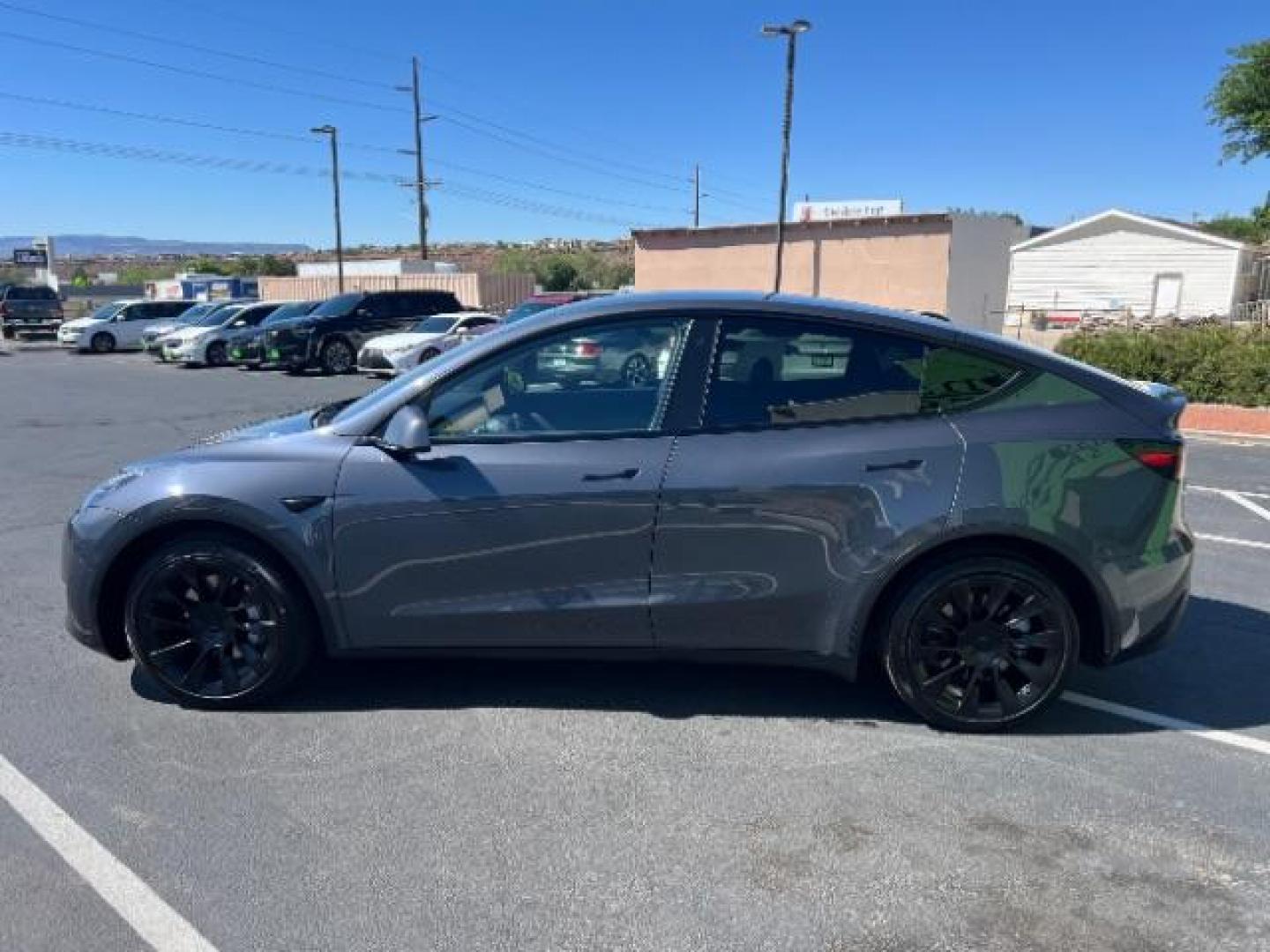 2021 Midnight Silver Metallic /Black Tesla Model Y Long Range Dual Motor All-Wheel Drive (5YJYGDEE0MF) with an ELECTRIC engine, Electric transmission, located at 1865 East Red Hills Pkwy, St. George, 84770, (435) 628-0023, 37.120850, -113.543640 - Excellent Tesla Model Y Long Range All Wheel Drive with Full Self Driving Paid for. Thats a $8k add on that is no longer avilable from Tesla. HW3. Inside and outside in great shape. Has PPF on front and Yoke steering wheel. Tires are good. All our Teslas come with charging kit. Battery is healthy. - Photo#5