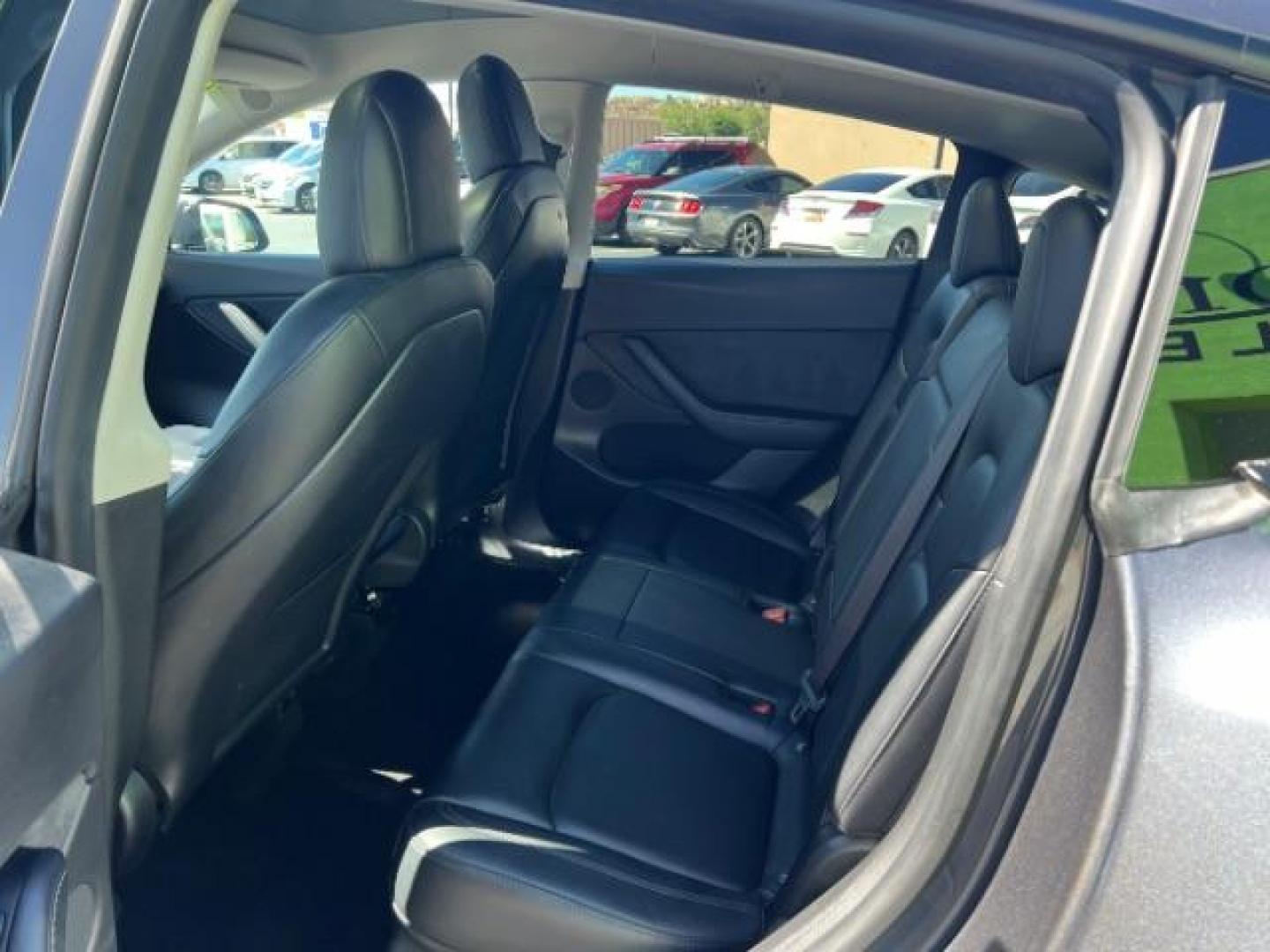 2021 Midnight Silver Metallic /Black Tesla Model Y Long Range Dual Motor All-Wheel Drive (5YJYGDEE0MF) with an ELECTRIC engine, Electric transmission, located at 1865 East Red Hills Pkwy, St. George, 84770, (435) 628-0023, 37.120850, -113.543640 - Excellent Tesla Model Y Long Range All Wheel Drive with Full Self Driving Paid for. Thats a $8k add on that is no longer avilable from Tesla. HW3. Inside and outside in great shape. Has PPF on front and Yoke steering wheel. Tires are good. All our Teslas come with charging kit. Battery is healthy. - Photo#21