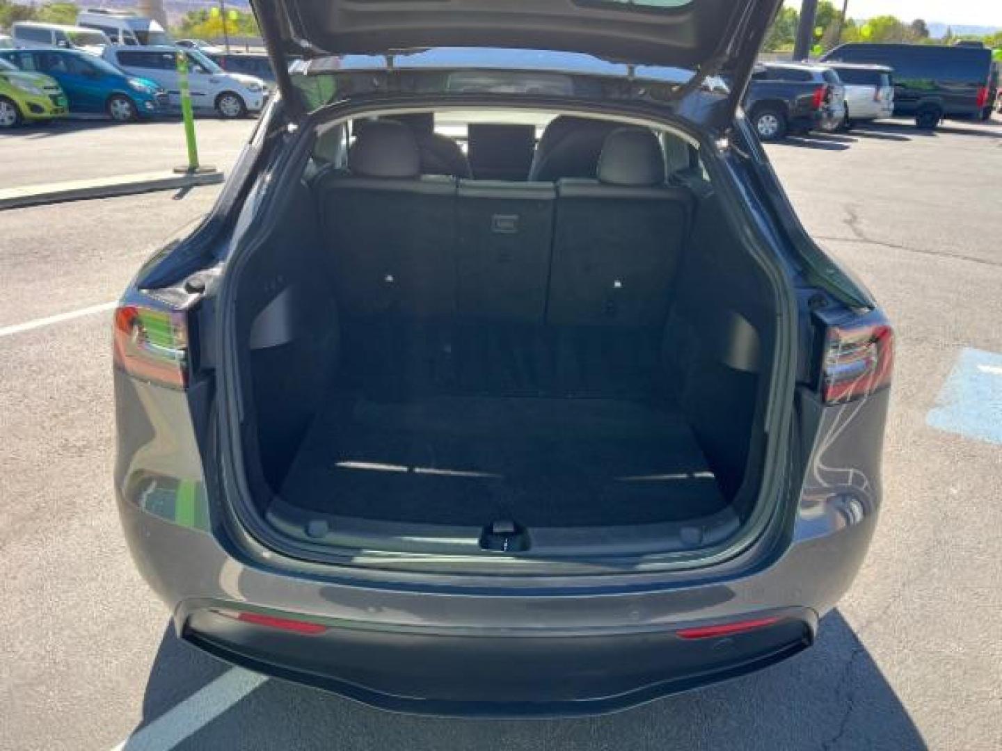2021 Midnight Silver Metallic /Black Tesla Model Y Long Range Dual Motor All-Wheel Drive (5YJYGDEE0MF) with an ELECTRIC engine, Electric transmission, located at 1865 East Red Hills Pkwy, St. George, 84770, (435) 628-0023, 37.120850, -113.543640 - Excellent Tesla Model Y Long Range All Wheel Drive with Full Self Driving Paid for. Thats a $8k add on that is no longer avilable from Tesla. HW3. Inside and outside in great shape. Has PPF on front and Yoke steering wheel. Tires are good. All our Teslas come with charging kit. Battery is healthy. - Photo#24