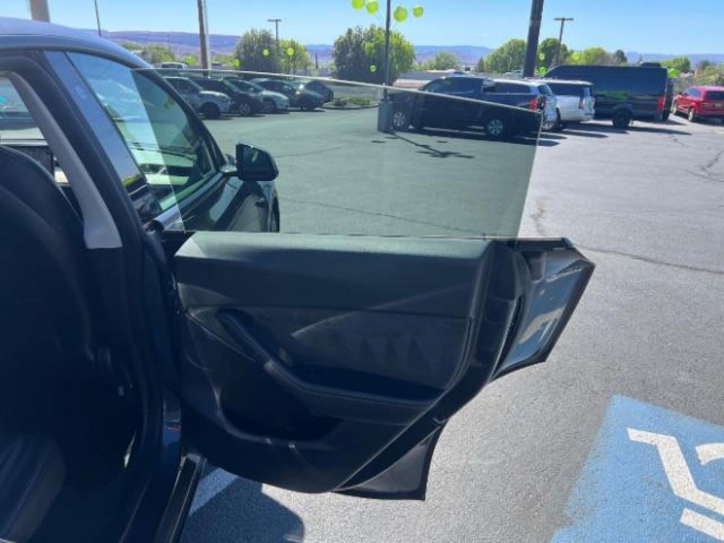 2021 Midnight Silver Metallic /Black Tesla Model Y Long Range Dual Motor All-Wheel Drive (5YJYGDEE0MF) with an ELECTRIC engine, Electric transmission, located at 1865 East Red Hills Pkwy, St. George, 84770, (435) 628-0023, 37.120850, -113.543640 - Excellent Tesla Model Y Long Range All Wheel Drive with Full Self Driving Paid for. Thats a $8k add on that is no longer avilable from Tesla. HW3. Inside and outside in great shape. Has PPF on front and Yoke steering wheel. Tires are good. All our Teslas come with charging kit. Battery is healthy. - Photo#25