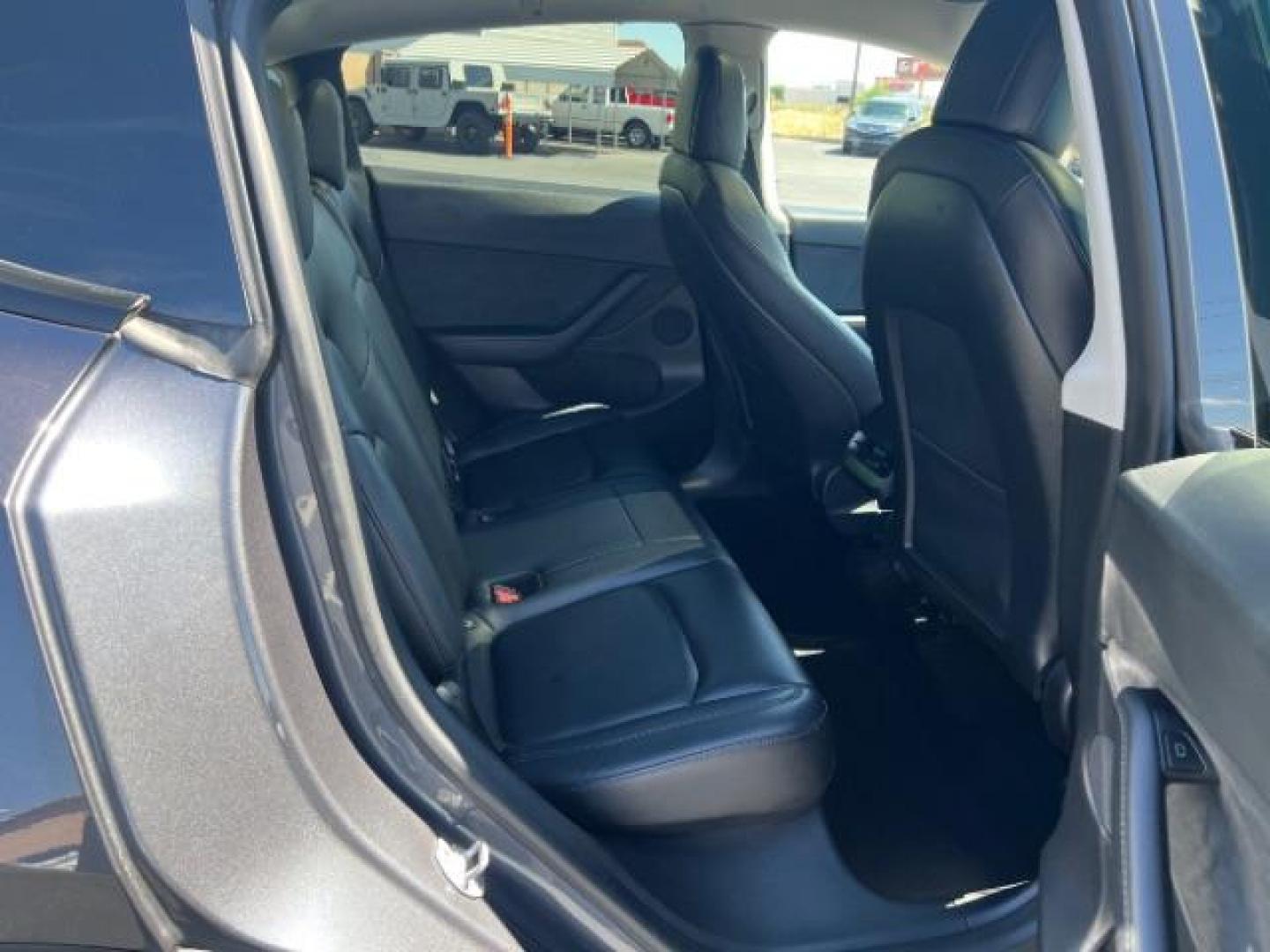 2021 Midnight Silver Metallic /Black Tesla Model Y Long Range Dual Motor All-Wheel Drive (5YJYGDEE0MF) with an ELECTRIC engine, Electric transmission, located at 1865 East Red Hills Pkwy, St. George, 84770, (435) 628-0023, 37.120850, -113.543640 - Excellent Tesla Model Y Long Range All Wheel Drive with Full Self Driving Paid for. Thats a $8k add on that is no longer avilable from Tesla. HW3. Inside and outside in great shape. Has PPF on front and Yoke steering wheel. Tires are good. All our Teslas come with charging kit. Battery is healthy. - Photo#26