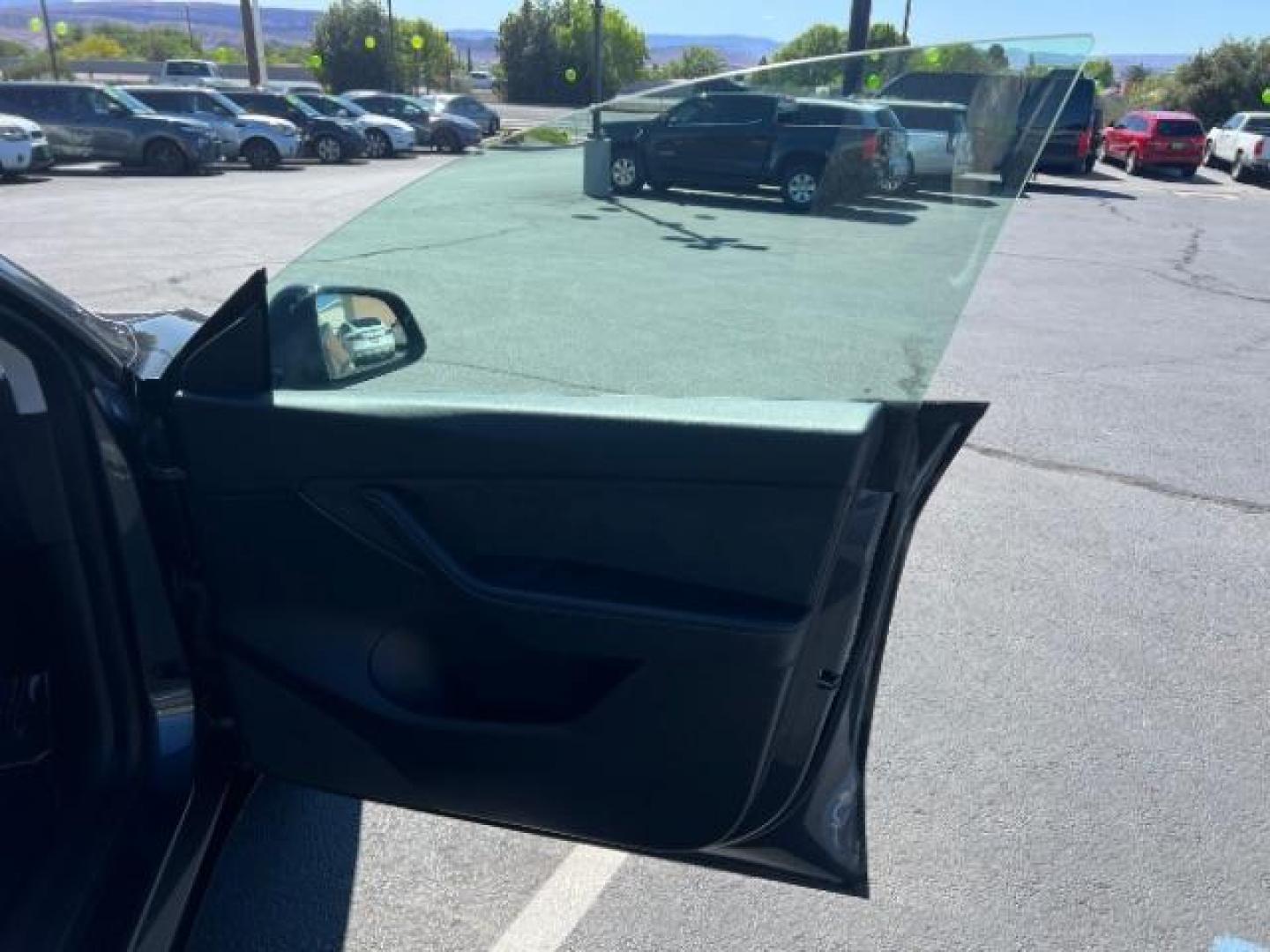 2021 Midnight Silver Metallic /Black Tesla Model Y Long Range Dual Motor All-Wheel Drive (5YJYGDEE0MF) with an ELECTRIC engine, Electric transmission, located at 1865 East Red Hills Pkwy, St. George, 84770, (435) 628-0023, 37.120850, -113.543640 - Excellent Tesla Model Y Long Range All Wheel Drive with Full Self Driving Paid for. Thats a $8k add on that is no longer avilable from Tesla. HW3. Inside and outside in great shape. Has PPF on front and Yoke steering wheel. Tires are good. All our Teslas come with charging kit. Battery is healthy. - Photo#27
