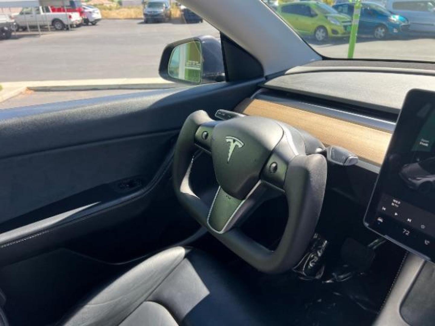 2021 Midnight Silver Metallic /Black Tesla Model Y Long Range Dual Motor All-Wheel Drive (5YJYGDEE0MF) with an ELECTRIC engine, Electric transmission, located at 1865 East Red Hills Pkwy, St. George, 84770, (435) 628-0023, 37.120850, -113.543640 - Excellent Tesla Model Y Long Range All Wheel Drive with Full Self Driving Paid for. Thats a $8k add on that is no longer avilable from Tesla. HW3. Inside and outside in great shape. Has PPF on front and Yoke steering wheel. Tires are good. All our Teslas come with charging kit. Battery is healthy. - Photo#29