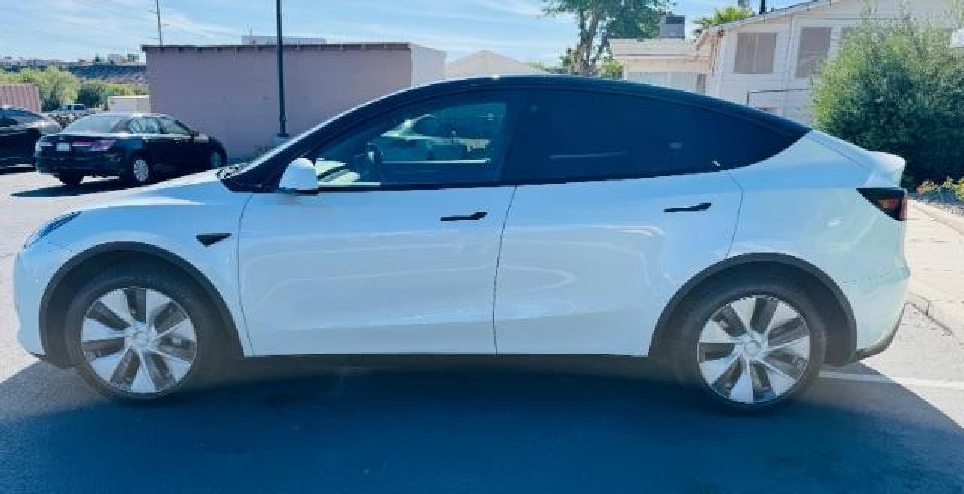 2023 Pearl White Multi-Coat /Black Tesla Model Y Long Range Dual Motor All-Wheel Drive | AWD (7SAYGAEE0PF) with an ELECTRIC engine, Electric transmission, located at 1865 East Red Hills Pkwy, St. George, 84770, (435) 628-0023, 37.120850, -113.543640 - Photo#2