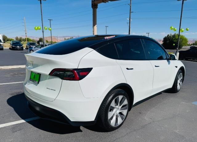 2023 Pearl White Multi-Coat /Black Tesla Model Y Long Range Dual Motor All-Wheel Drive | AWD (7SAYGAEE0PF) with an ELECTRIC engine, Electric transmission, located at 1865 East Red Hills Pkwy, St. George, 84770, (435) 628-0023, 37.120850, -113.543640 - Excellent Tesla Model Y Long Range All Wheel Drive with 3rd row. 7seats. HW3. Inside and outside in great shape. Tires are good. All our Teslas come with charging kit. Battery is healthy. Gets 285 on full charge. Clean title, no accidents Still has remaining 120k mile Tesla warranty on battery a - Photo#5