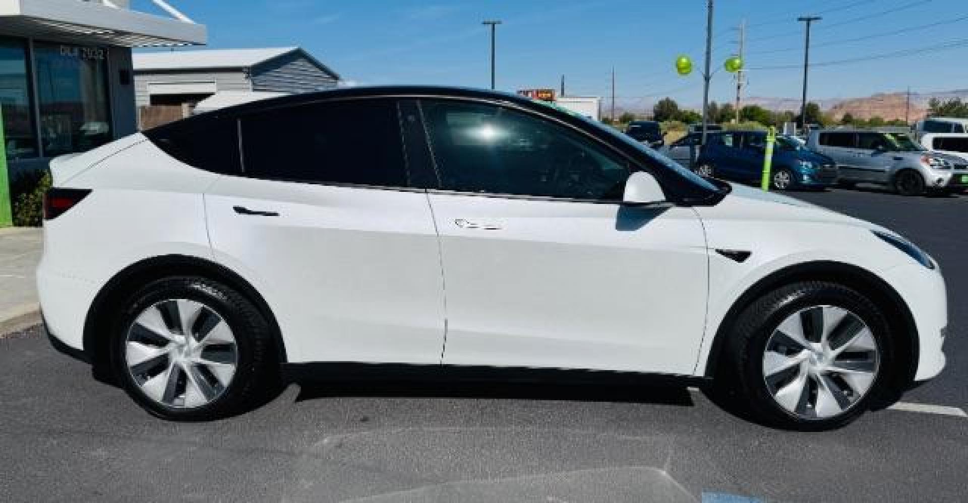 2023 Pearl White Multi-Coat /Black Tesla Model Y Long Range Dual Motor All-Wheel Drive | AWD (7SAYGAEE0PF) with an ELECTRIC engine, Electric transmission, located at 1865 East Red Hills Pkwy, St. George, 84770, (435) 628-0023, 37.120850, -113.543640 - Photo#6