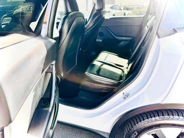 2023 Pearl White Multi-Coat /Black Tesla Model Y Long Range Dual Motor All-Wheel Drive | AWD (7SAYGAEE0PF) with an ELECTRIC engine, Electric transmission, located at 1865 East Red Hills Pkwy, St. George, 84770, (435) 628-0023, 37.120850, -113.543640 - Excellent Tesla Model Y Long Range All Wheel Drive with 3rd row. 7seats. HW3. Inside and outside in great shape. Tires are good. All our Teslas come with charging kit. Battery is healthy. Gets 285 on full charge. Clean title, no accidents Still has remaining 120k mile Tesla warranty on battery a - Photo#11