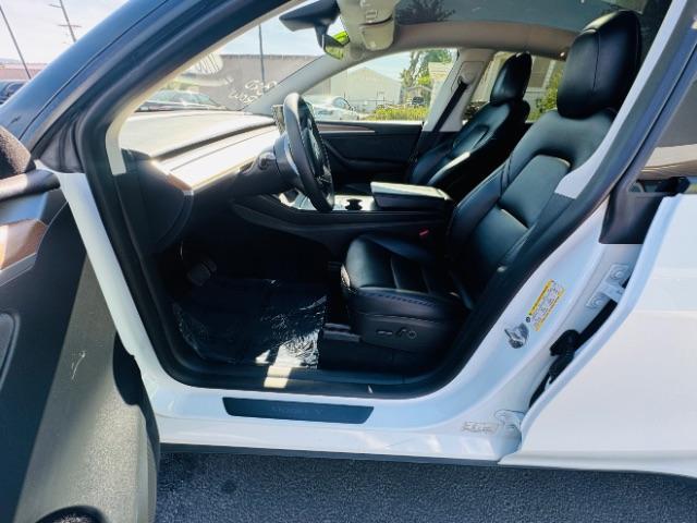 2023 Pearl White Multi-Coat /Black Tesla Model Y Long Range Dual Motor All-Wheel Drive | AWD (7SAYGAEE0PF) with an ELECTRIC engine, Electric transmission, located at 1865 East Red Hills Pkwy, St. George, 84770, (435) 628-0023, 37.120850, -113.543640 - Excellent Tesla Model Y Long Range All Wheel Drive with 3rd row. 7seats. HW3. Inside and outside in great shape. Tires are good. All our Teslas come with charging kit. Battery is healthy. Gets 285 on full charge. Clean title, no accidents Still has remaining 120k mile Tesla warranty on battery a - Photo#13