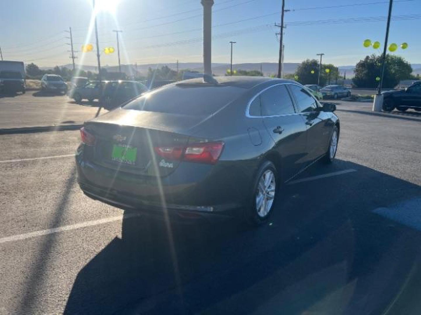 2016 Nightfall Gray Metallic /Dark Atmosphere/Loft Brown Chevrolet Malibu 1LT (1G1ZE5ST1GF) with an ECOTEC 1.5L I-4 gasoline direct injection engine, Automatic transmission, located at 1865 East Red Hills Pkwy, St. George, 84770, (435) 628-0023, 37.120850, -113.543640 - Photo#6