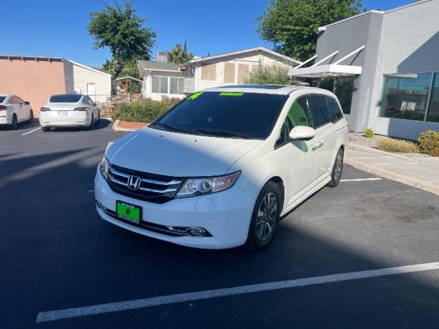 2014 White Diamond Pearl /Truffle Honda Odyssey Touring | Touring Elite (5FNRL5H99EB) with an 3.5L V-6 i-VTEC variable valve control engine, Automatic transmission, located at 1865 East Red Hills Pkwy, St. George, 84770, (435) 628-0023, 37.120850, -113.543640 - We specialize in helping ALL people get the best financing available. No matter your credit score, good, bad or none we can get you an amazing rate. Had a bankruptcy, divorce, or repossessions? We give you the green light to get your credit back on the road. Low down and affordable payments that fit - Photo#2