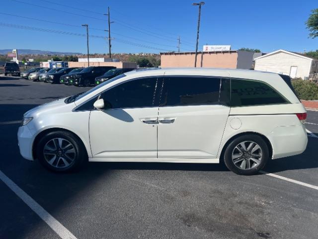 2014 White Diamond Pearl /Truffle Honda Odyssey Touring | Touring Elite (5FNRL5H99EB) with an 3.5L V-6 i-VTEC variable valve control engine, Automatic transmission, located at 1865 East Red Hills Pkwy, St. George, 84770, (435) 628-0023, 37.120850, -113.543640 - We specialize in helping ALL people get the best financing available. No matter your credit score, good, bad or none we can get you an amazing rate. Had a bankruptcy, divorce, or repossessions? We give you the green light to get your credit back on the road. Low down and affordable payments that fit - Photo#3