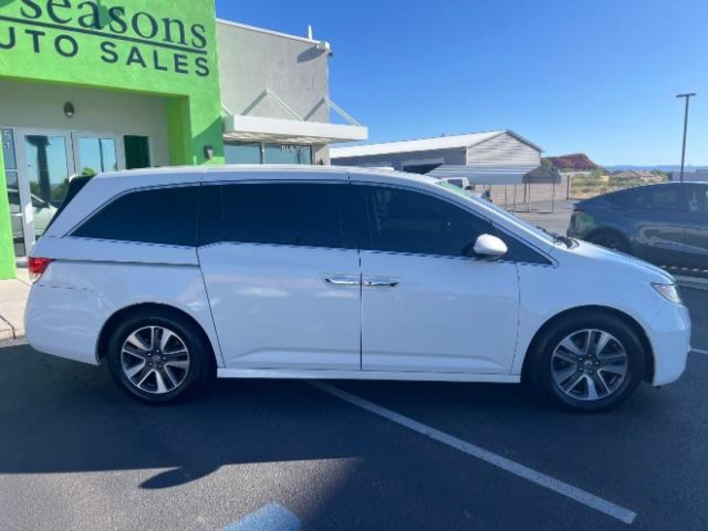2014 White Diamond Pearl /Truffle Honda Odyssey Touring | Touring Elite (5FNRL5H99EB) with an 3.5L V-6 i-VTEC variable valve control engine, Automatic transmission, located at 1865 East Red Hills Pkwy, St. George, 84770, (435) 628-0023, 37.120850, -113.543640 - We specialize in helping ALL people get the best financing available. No matter your credit score, good, bad or none we can get you an amazing rate. Had a bankruptcy, divorce, or repossessions? We give you the green light to get your credit back on the road. Low down and affordable payments that fit - Photo#7