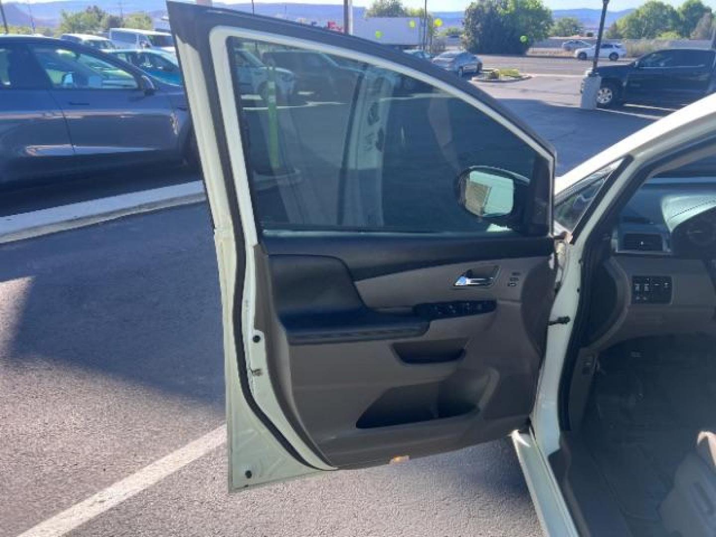2014 White Diamond Pearl /Truffle Honda Odyssey Touring | Touring Elite (5FNRL5H99EB) with an 3.5L V-6 i-VTEC variable valve control engine, Automatic transmission, located at 1865 East Red Hills Pkwy, St. George, 84770, (435) 628-0023, 37.120850, -113.543640 - We specialize in helping ALL people get the best financing available. No matter your credit score, good, bad or none we can get you an amazing rate. Had a bankruptcy, divorce, or repossessions? We give you the green light to get your credit back on the road. Low down and affordable payments that fit - Photo#12