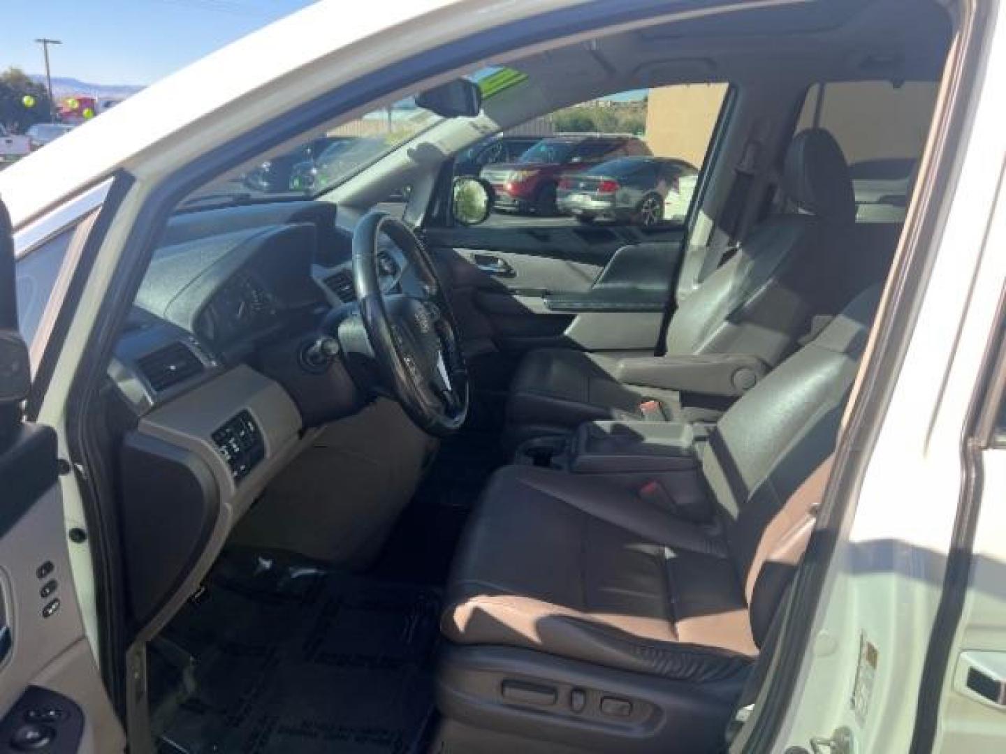 2014 White Diamond Pearl /Truffle Honda Odyssey Touring | Touring Elite (5FNRL5H99EB) with an 3.5L V-6 i-VTEC variable valve control engine, Automatic transmission, located at 1865 East Red Hills Pkwy, St. George, 84770, (435) 628-0023, 37.120850, -113.543640 - We specialize in helping ALL people get the best financing available. No matter your credit score, good, bad or none we can get you an amazing rate. Had a bankruptcy, divorce, or repossessions? We give you the green light to get your credit back on the road. Low down and affordable payments that fit - Photo#14