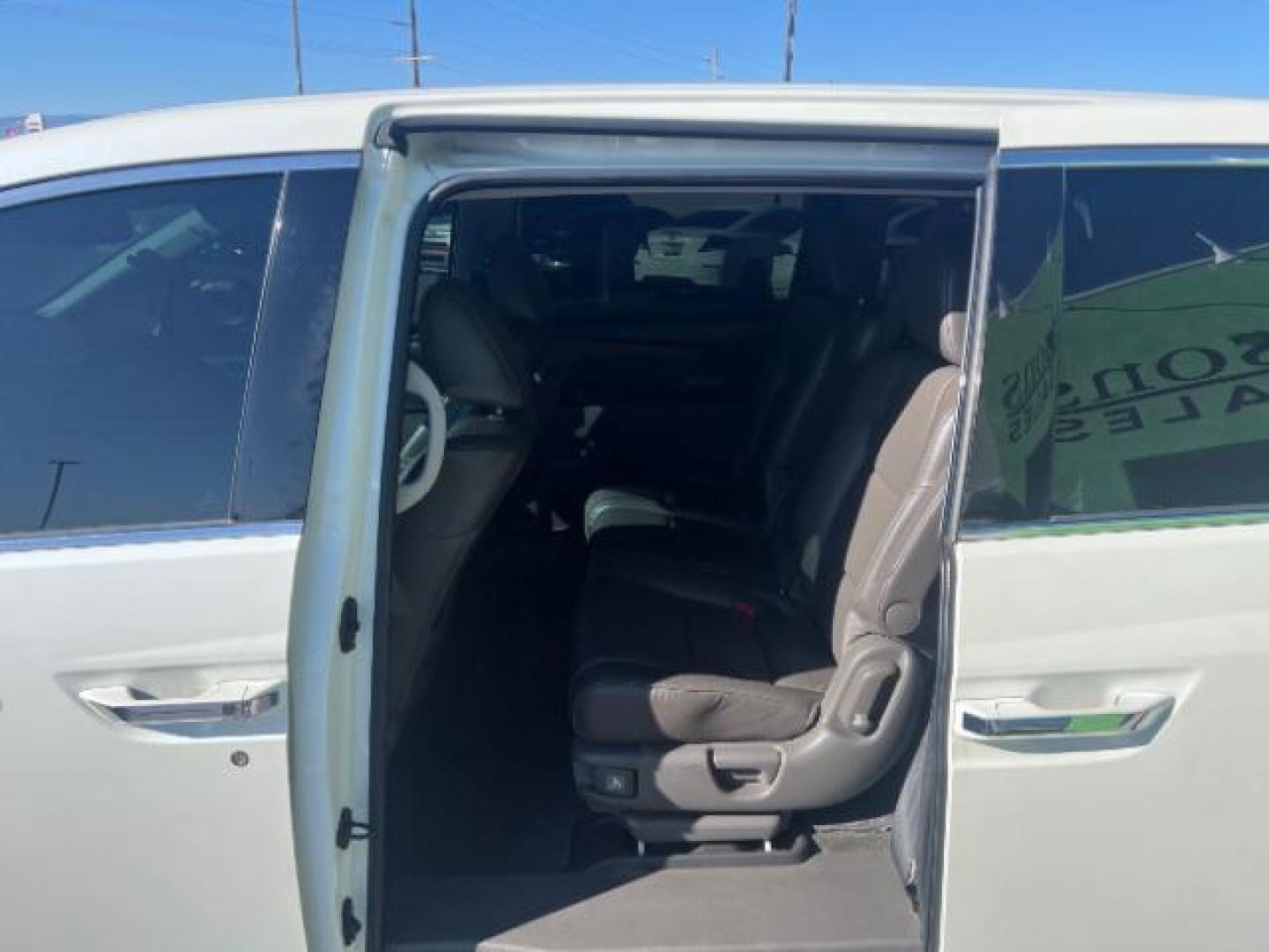 2014 White Diamond Pearl /Truffle Honda Odyssey Touring | Touring Elite (5FNRL5H99EB) with an 3.5L V-6 i-VTEC variable valve control engine, Automatic transmission, located at 1865 East Red Hills Pkwy, St. George, 84770, (435) 628-0023, 37.120850, -113.543640 - We specialize in helping ALL people get the best financing available. No matter your credit score, good, bad or none we can get you an amazing rate. Had a bankruptcy, divorce, or repossessions? We give you the green light to get your credit back on the road. Low down and affordable payments that fit - Photo#19