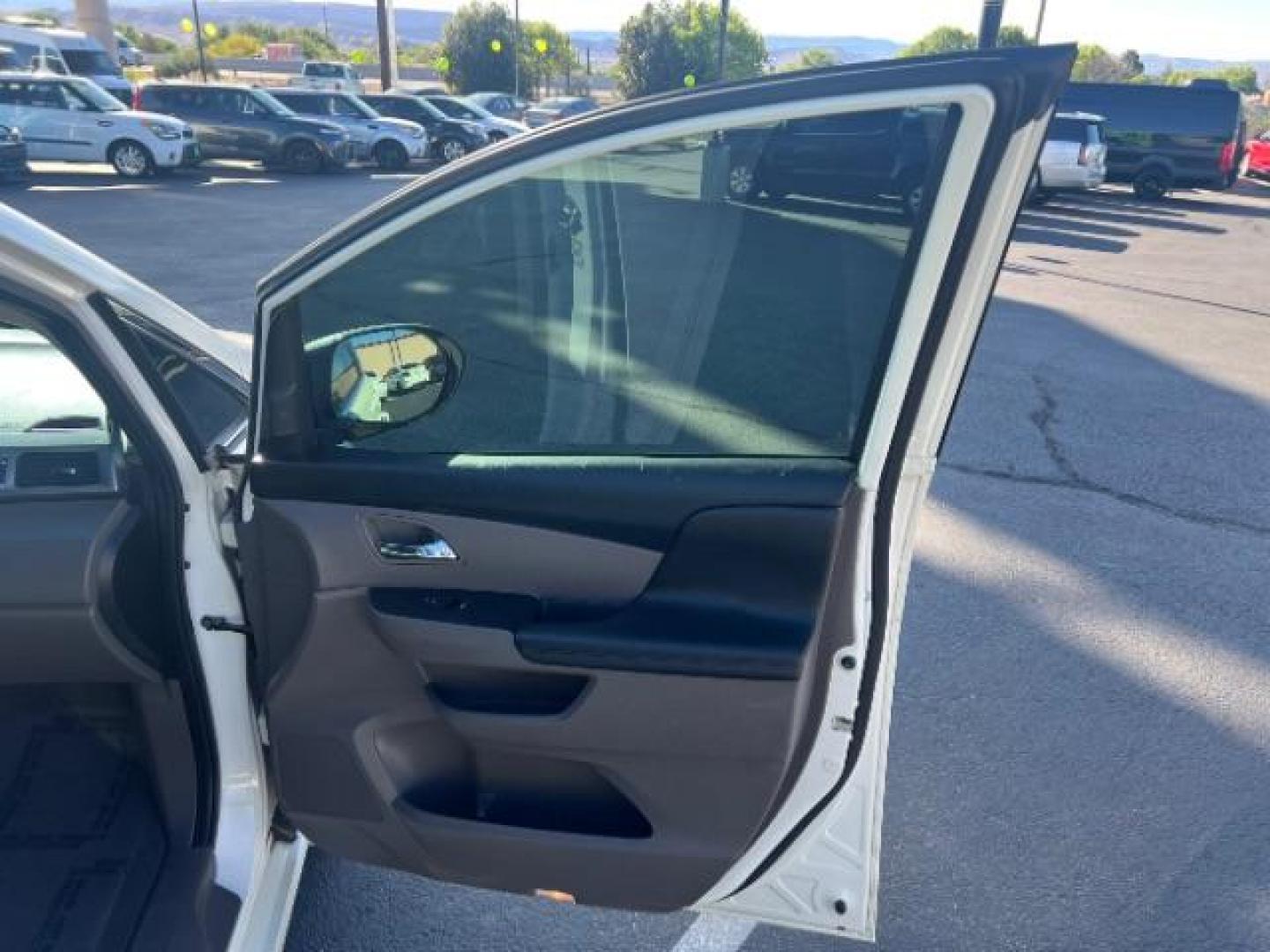 2014 White Diamond Pearl /Truffle Honda Odyssey Touring | Touring Elite (5FNRL5H99EB) with an 3.5L V-6 i-VTEC variable valve control engine, Automatic transmission, located at 1865 East Red Hills Pkwy, St. George, 84770, (435) 628-0023, 37.120850, -113.543640 - We specialize in helping ALL people get the best financing available. No matter your credit score, good, bad or none we can get you an amazing rate. Had a bankruptcy, divorce, or repossessions? We give you the green light to get your credit back on the road. Low down and affordable payments that fit - Photo#27