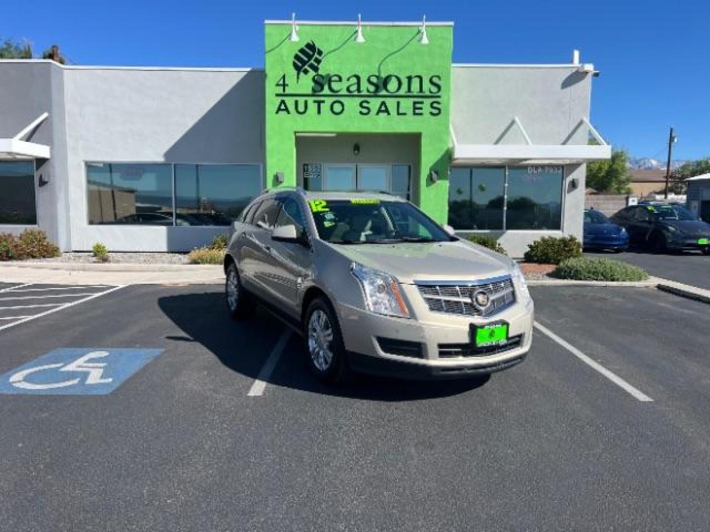 2012 Mocha Steel Metallic /Shale/Ebony Accents Cadillac SRX Luxury Collection (3GYFNDE3XCS) with an 3.6L V-6 gasoline direct injection engine, Automatic transmission, located at 1865 East Red Hills Pkwy, St. George, 84770, (435) 628-0023, 37.120850, -113.543640 - Photo#0