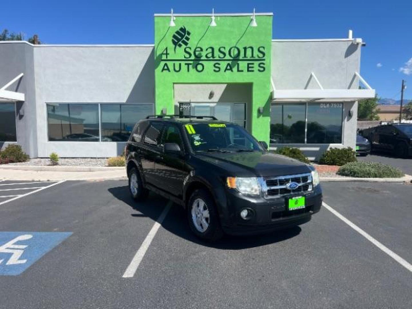 2011 Tuxedo Black Metallic /Stone Ford Escape XLT (1FMCU0D71BK) , Automatic transmission, located at 940 North Main Street, Cedar City, UT, 84720, (435) 628-0023, 37.692936, -113.061897 - We specialize in helping ALL people get the best financing available. No matter your credit score, good, bad or none we can get you an amazing rate. Had a bankruptcy, divorce, or repossessions? We give you the green light to get your credit back on the road. Low down and affordable payments that fit- Photo#0