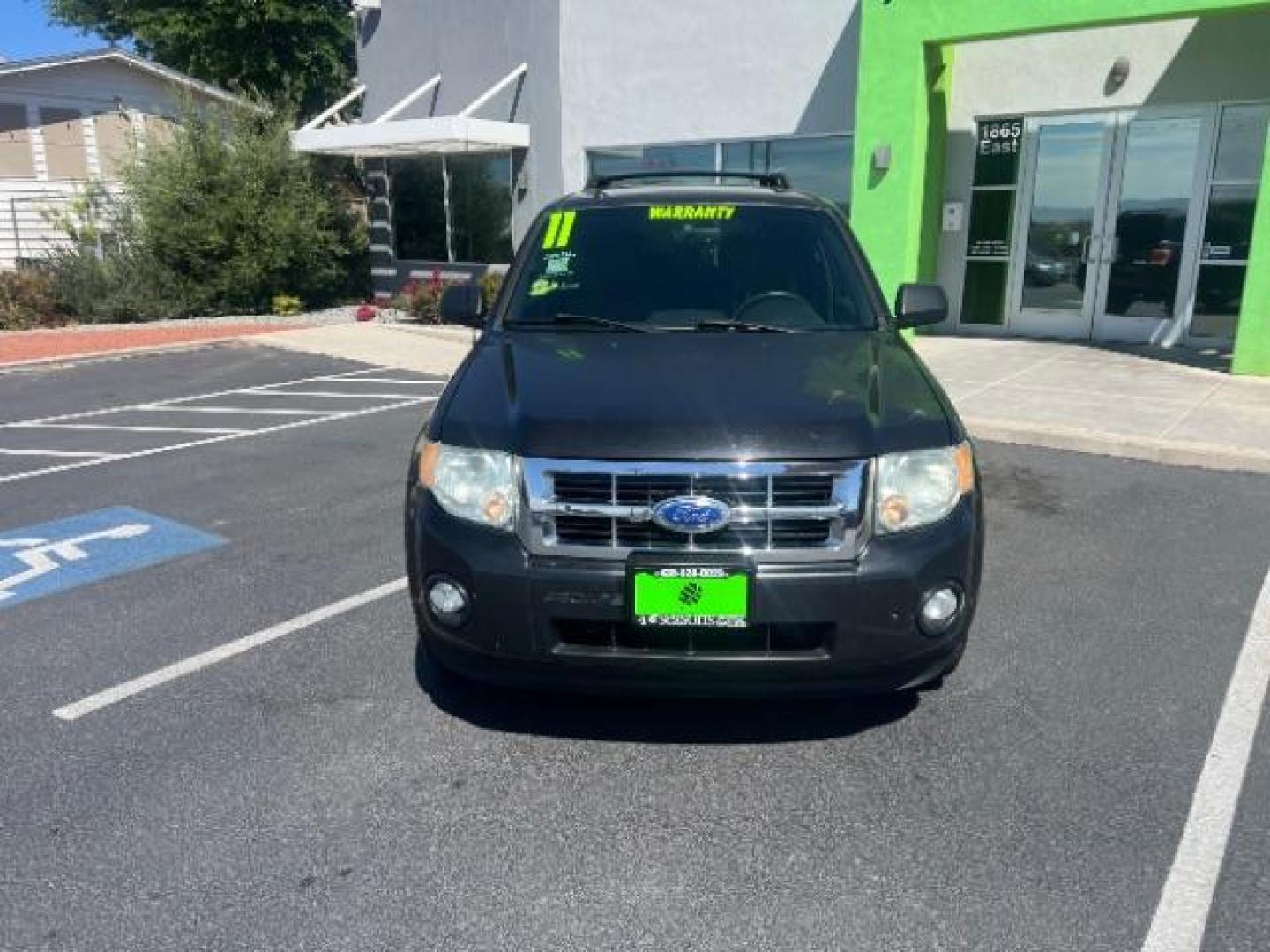 2011 Tuxedo Black Metallic /Stone Ford Escape XLT (1FMCU0D71BK) , Automatic transmission, located at 940 North Main Street, Cedar City, UT, 84720, (435) 628-0023, 37.692936, -113.061897 - We specialize in helping ALL people get the best financing available. No matter your credit score, good, bad or none we can get you an amazing rate. Had a bankruptcy, divorce, or repossessions? We give you the green light to get your credit back on the road. Low down and affordable payments that fit- Photo#1