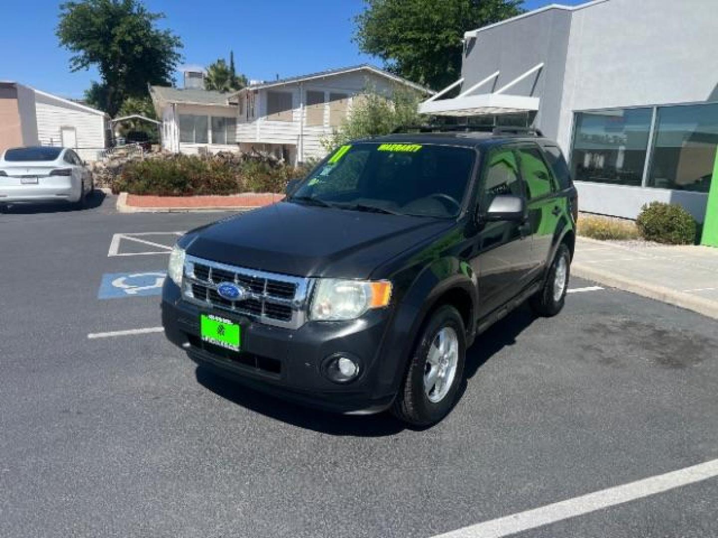 2011 Tuxedo Black Metallic /Stone Ford Escape XLT (1FMCU0D71BK) , Automatic transmission, located at 940 North Main Street, Cedar City, UT, 84720, (435) 628-0023, 37.692936, -113.061897 - We specialize in helping ALL people get the best financing available. No matter your credit score, good, bad or none we can get you an amazing rate. Had a bankruptcy, divorce, or repossessions? We give you the green light to get your credit back on the road. Low down and affordable payments that fit- Photo#2